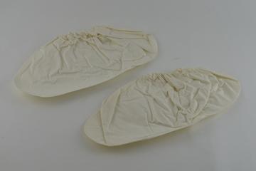 Pair of opaque polythene disposable overshoes