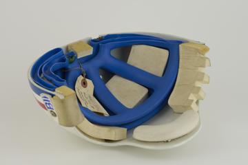 American football helmet (half-section piece) made by Uniroyal Limited