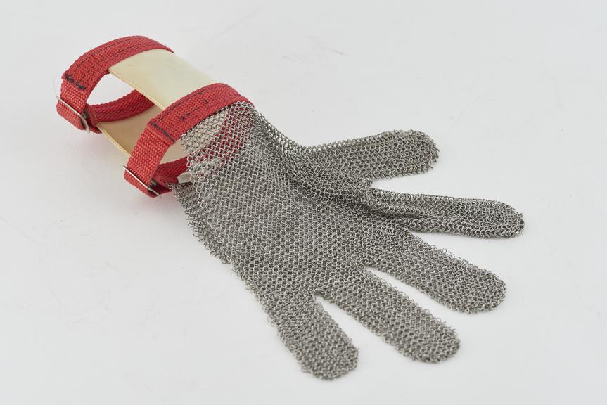 Chain mesh glove with rigid cuff,  United States, 1983.