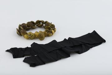 Buttons and fabric from Charles Health's uniform as surgeon to Orient Steam Navigation Company