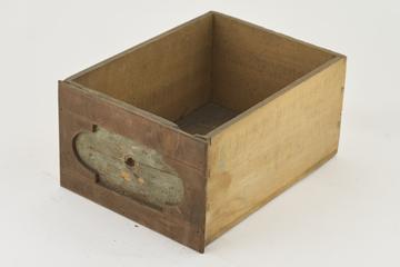 Wooden drawer with labels missing