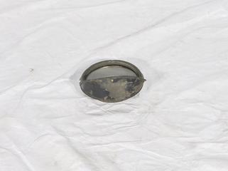 Lamp cover from Bradshaw motorcycle made by DOT Motors Ltd