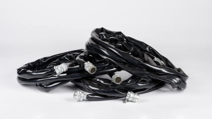 Three heavy mult-core cables tagged X