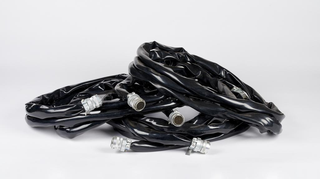 Three heavy mult-core cables tagged X