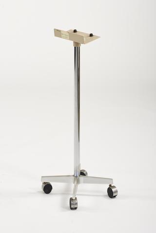 Supporting stand on four castors for supporting the CRT