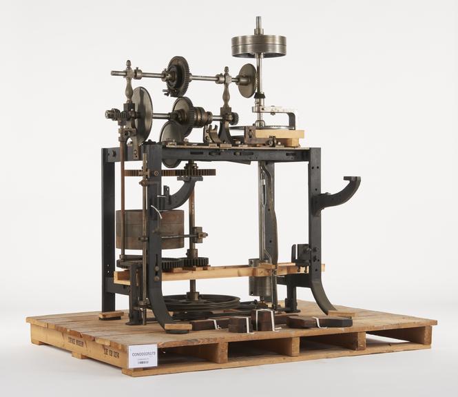 Headstock containing main gearing with three upright and three horizontal spindles