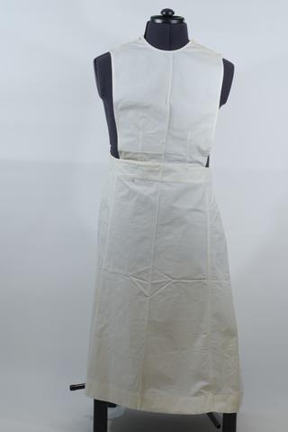 White heavy linen apron with button-up round bib