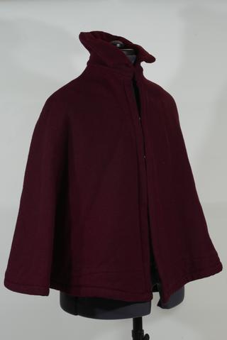 Red wool cape worn by nurse during training at Fallskirk and District Royal Infirmary