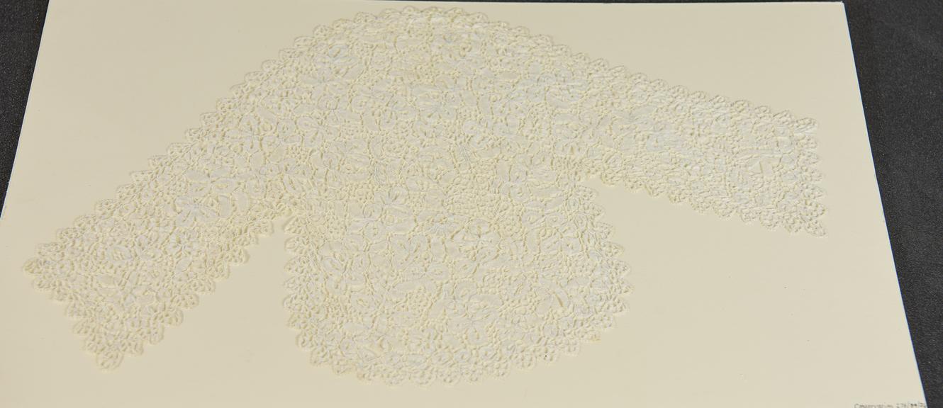 Cream lace cap with short lace panels at sides