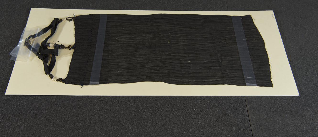 Black cloth yashmak with pewter(?) ornaments