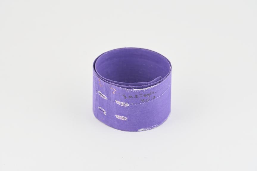 Plain purple stiffened nurse cloth belt with button holes