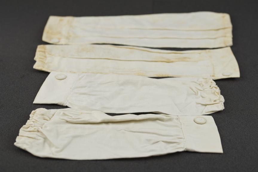Removable elasticated white linen nurse's sleeves