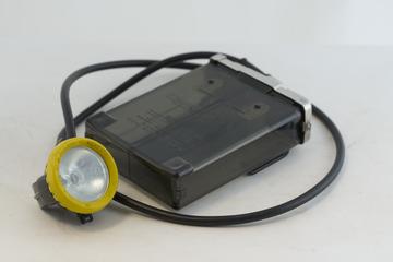 Miner's Cap Lamp and Battery Pack.