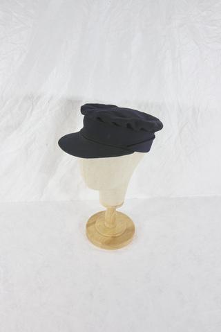 Dark blue serge peaked cap with stiffened eye shade