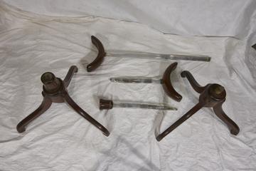 Two Glass Rods on Wooden Tripod Bases