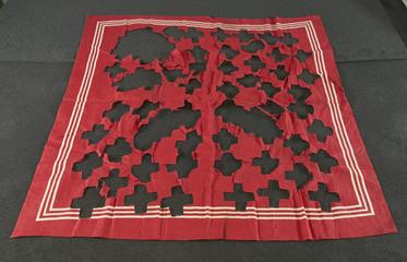 Large red cloth handkerchief from which Red Crosses were cut for nurses at Dar-es-Salaam