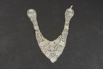 Small cap of crocheted lace