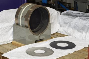 Large lens holder in cradle