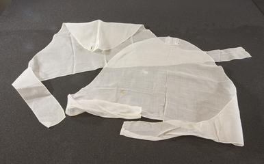 Two white plain voile triangular caps with extensions used as tying ribbons