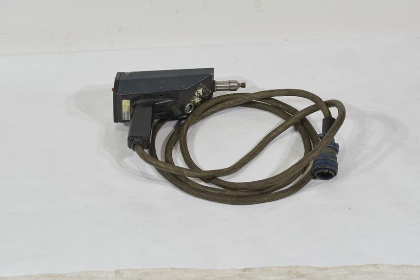 Model 27 explosives detector probe with a thick blue armoured cable