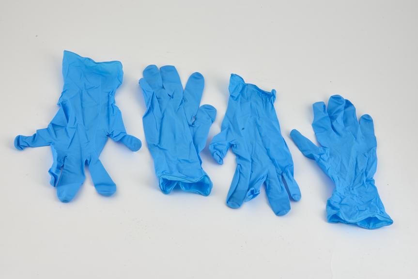 Four standard length blue latex gloves