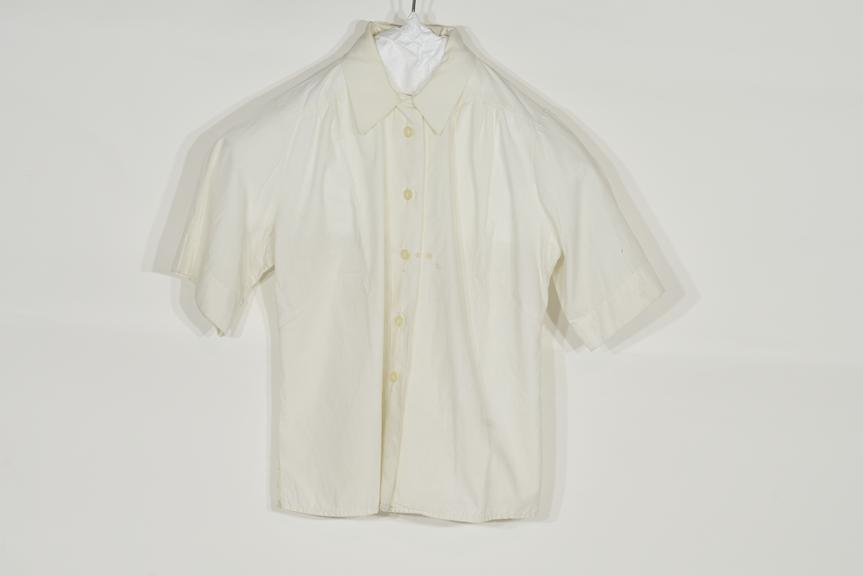 Regulation issue short-sleeved white cotton blouse with pearl buttons down front