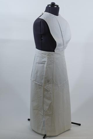 White linen apron with button-up round bib