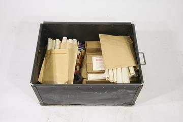 Two boxes containing spares, accessories and chart paper from an infrared spectrometer