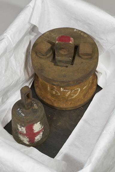 Piston and weight from lever safety valve