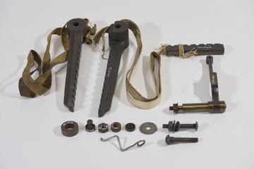 Two C.I. supports and part of one that is broken