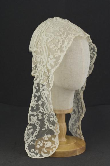 Cream lace cap with long panels at front