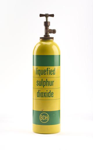 An empty bottle for sulphur dioxide.