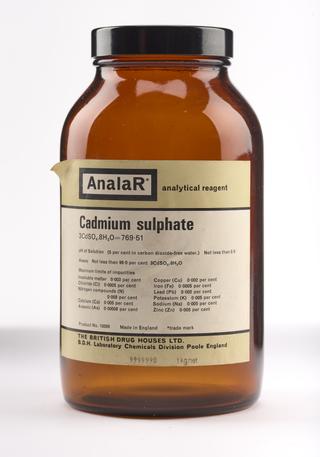 An empty brown glass bottle for cadmium sulphate.