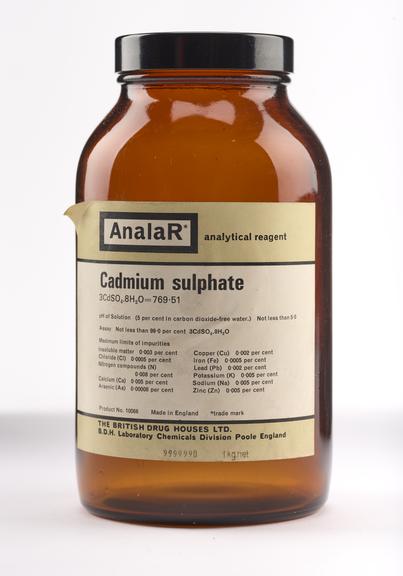 An empty brown glass bottle for cadmium sulphate.
