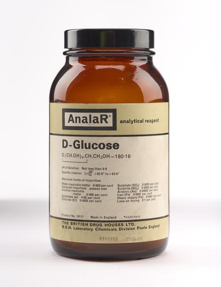 An empty brown glass bottle for d-glucose