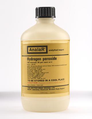 An empty polythene bottle for hydrogen peroxide.