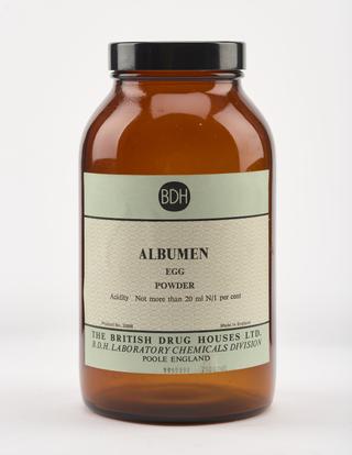An empty brown glass bottle for albumen.