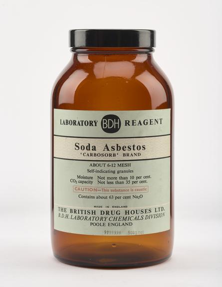 An empty brown glass bottle for soda asbestos.