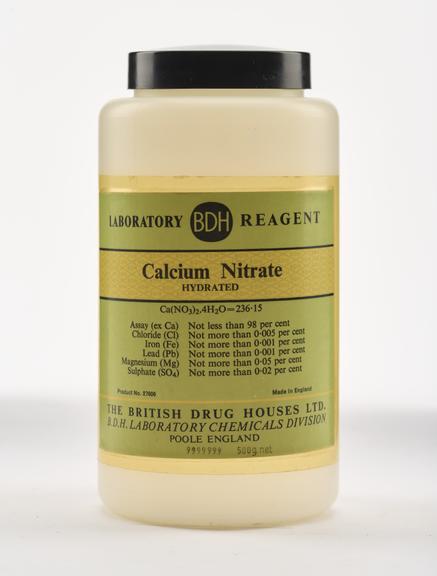 An empty plastic bottle for calcium nitrate.