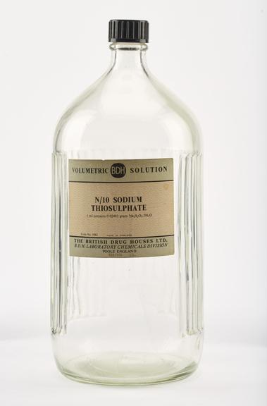 An empty clear glass bottle for sodium thiosulphate solution