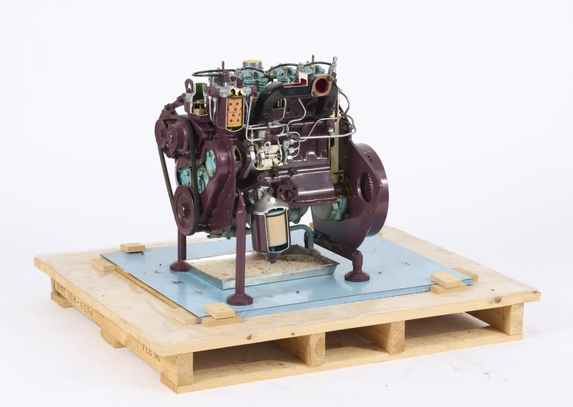 Perkins 4 cylinder compression-ignition motor car diesel engine with electric motor and chain drive