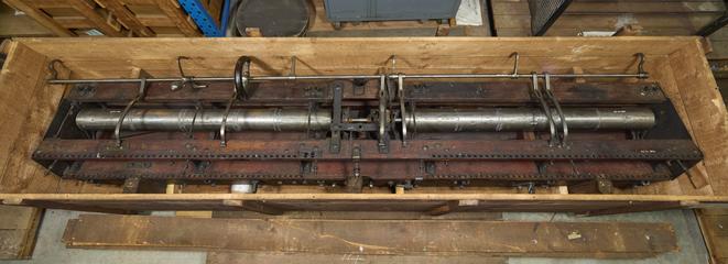 Long iron bar from carriage with six iron supporting arms