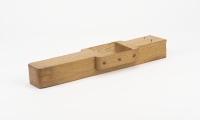 Back board and dispensing slot for model drill