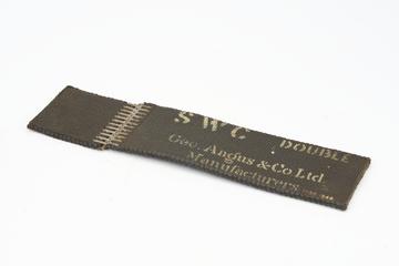Length of solid woven cotton belt double substance, joined with alligator fastener and rawhide pin
