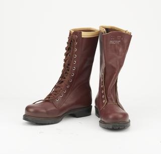 Pair of forestry worker's boots with ballastic nylon lining to legs
