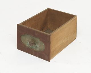 Wooden drawer with labels missing