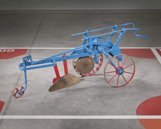 Plough mounted for use with Ransomes MG2 crawler