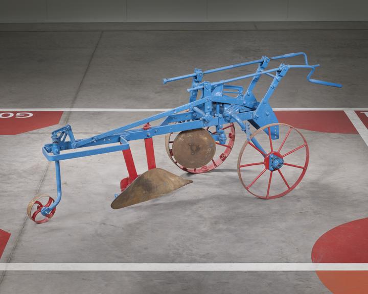 Plough mounted for use with Ransomes MG2 crawler
