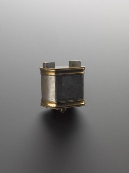 Lodestone, encased in brass