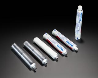 Ten stages in the manufacture of a tube of 'Aquafresh' toothpaste